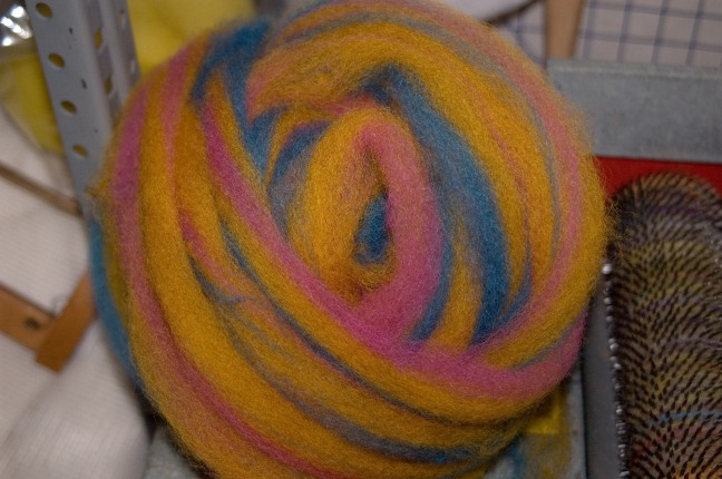 pink yellow and blue striped roving